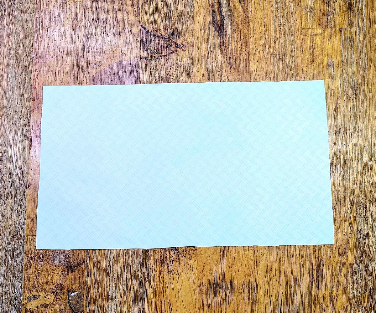 Toilet Paper Roll Craft- Step 2- Cover your cardboard with green paper- Kids Activities Blog
