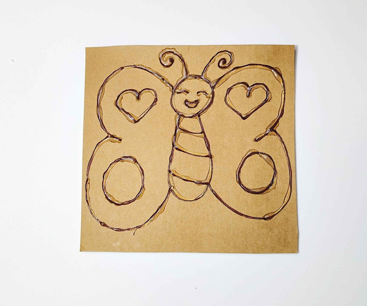 Foil Art- Step 3- trace with hot glue - Kids Activities blog