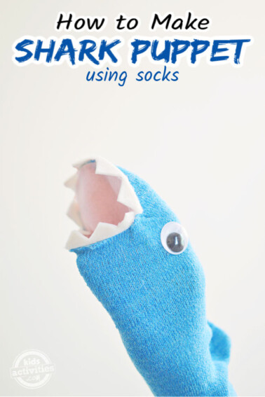 A cute shark puppet using socks is shown