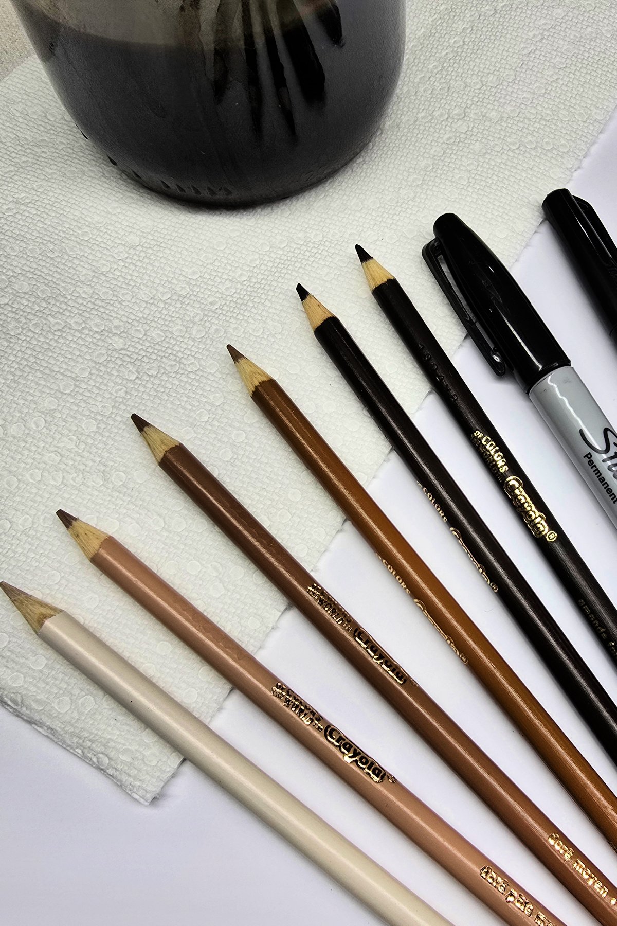 monochrome neurographic art supplies include coffee, cardstock, colored pencils, and permanent markers - kids activities blog