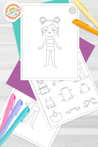 Image shows different paper doll coloring pages next to colored markers. Idea from Kids Activities Blog