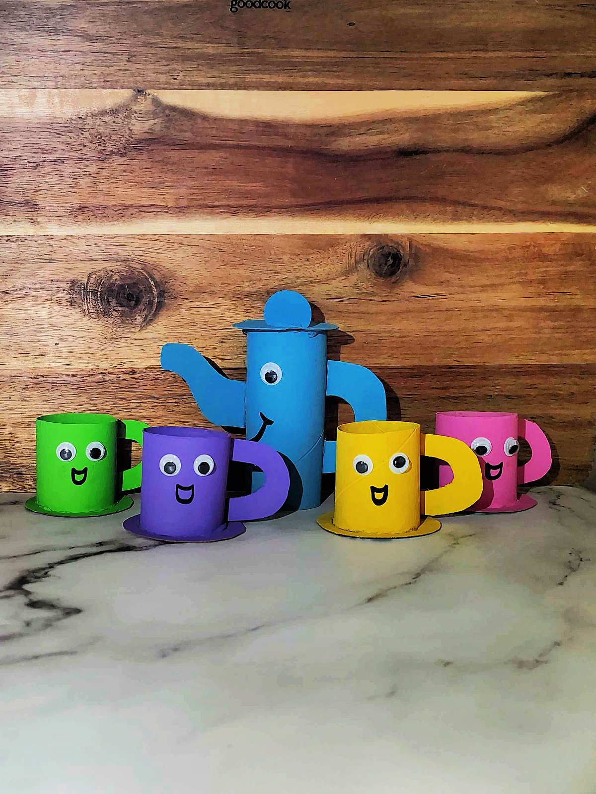 Tea cup craft- finished- with yellow pink, purple, green tea cups with googly eyes and blue tea pot with googly eyes- kids activities blog