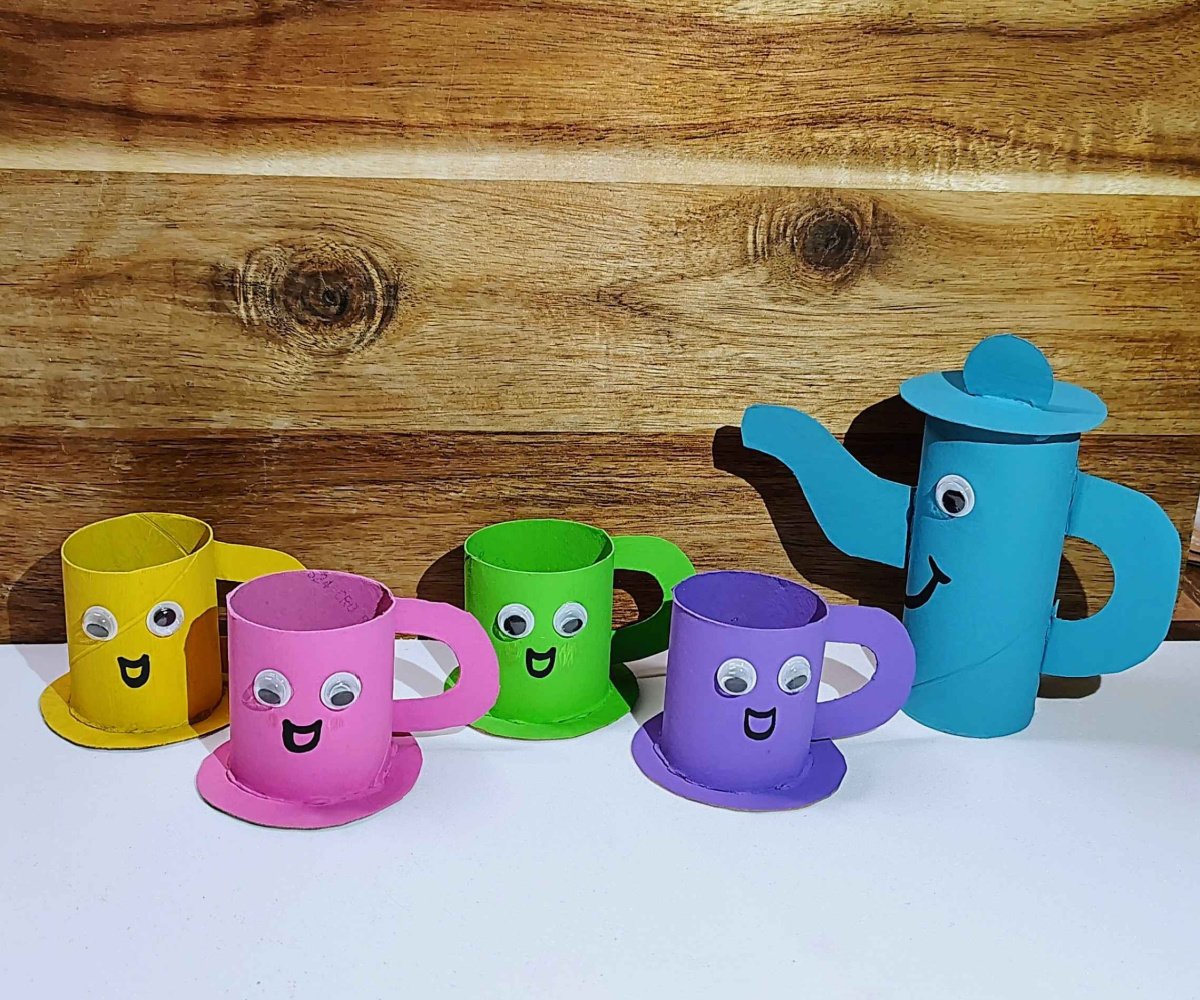 Paper Tea Cups- Step 10- painted cups and tea pot with googly eyes- Kids Activities Blog