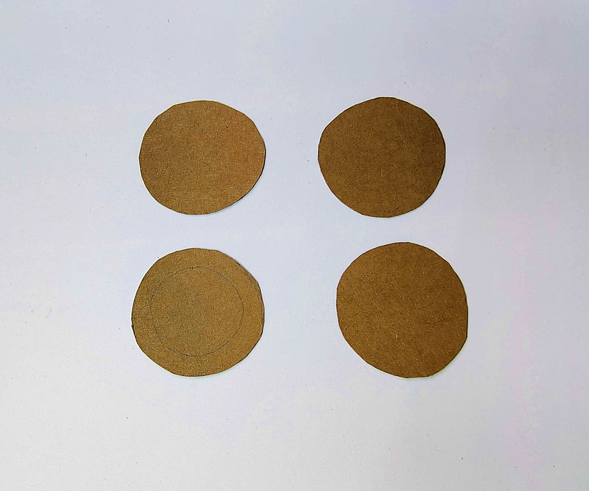 Paper Tea Cups- Step 3- Cut out the cardboard circles, 4 of them- Kids Activities Blog