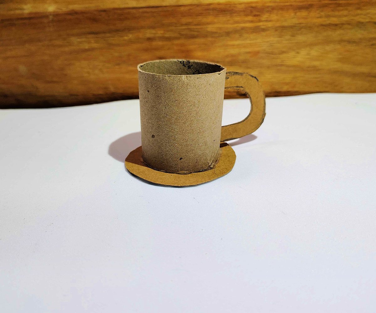 Paper Tea Cups- Step 6 - Glue toilet paper roll to circle and add u shaped handle- Kids Activities Blog